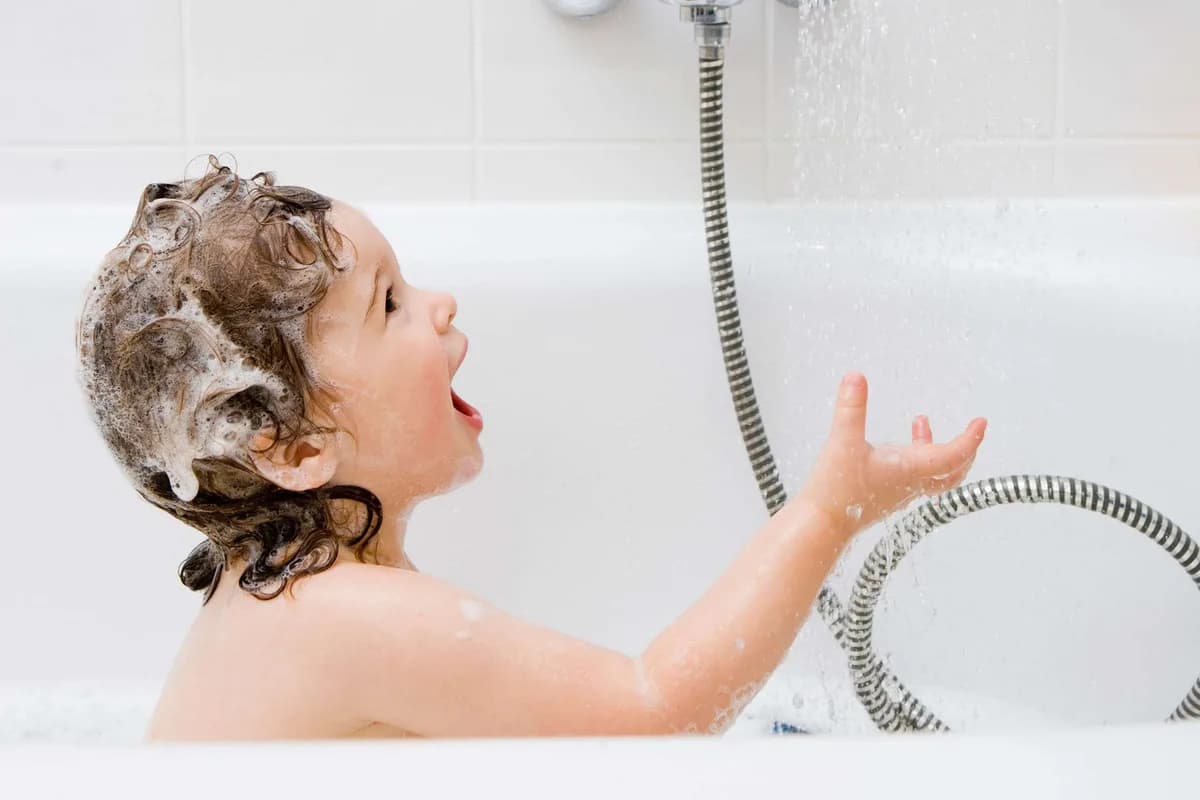Child enjoying a warm bath